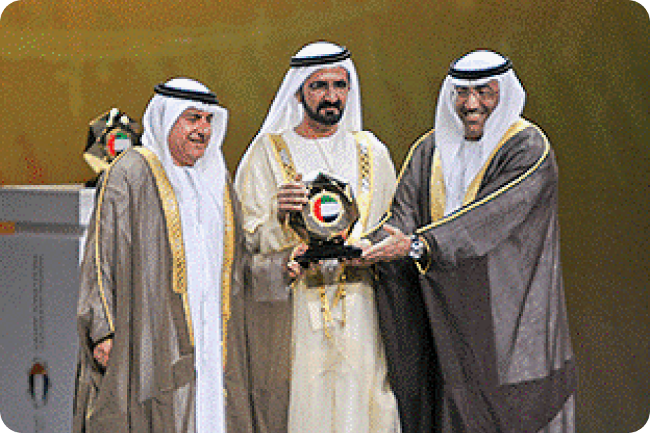 Ministry of Sports officials receiving the Distinguished Federal Entity Award on stage at the awards ceremony.